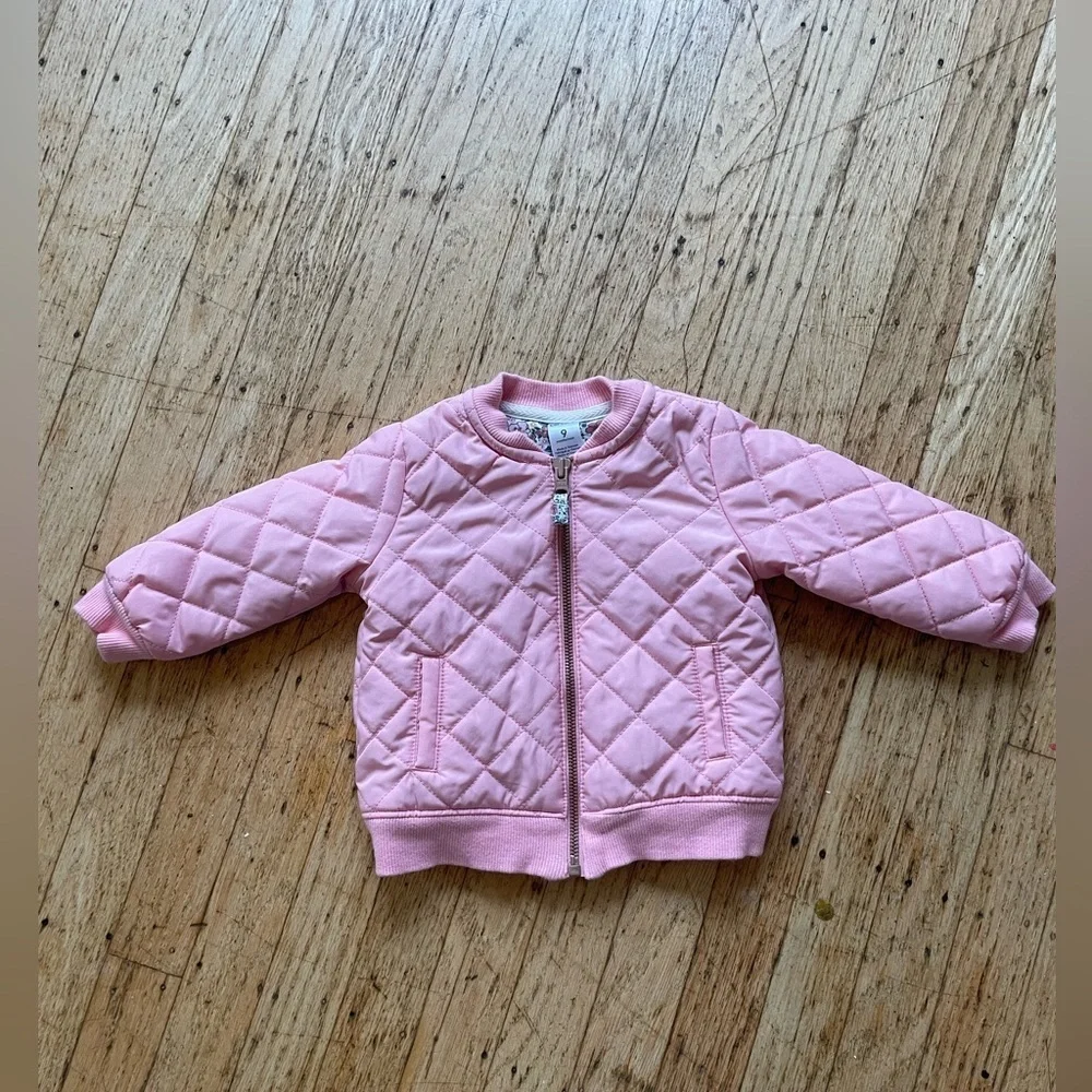 Quilted coat with floral details